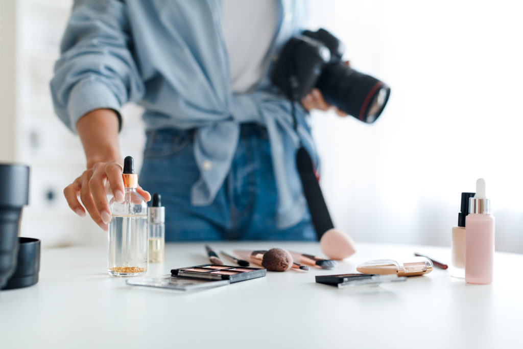 Woman sets up product photograph