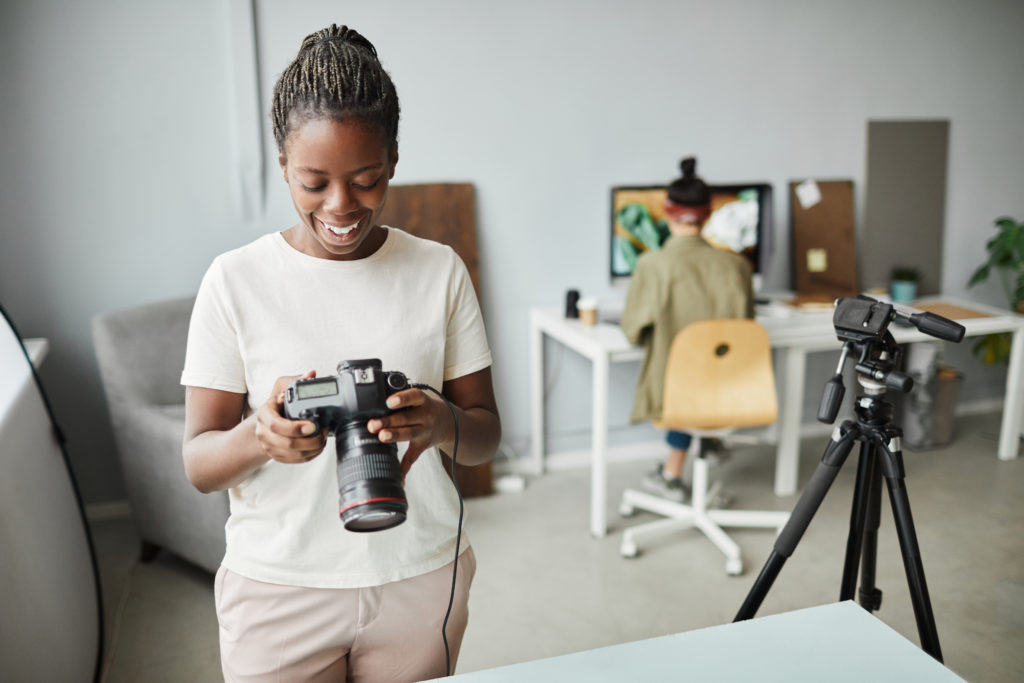 Woman photographer in studio