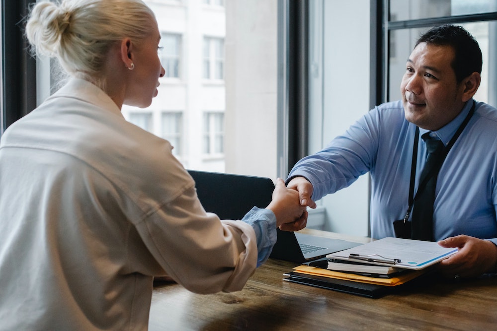 two people shaking hands