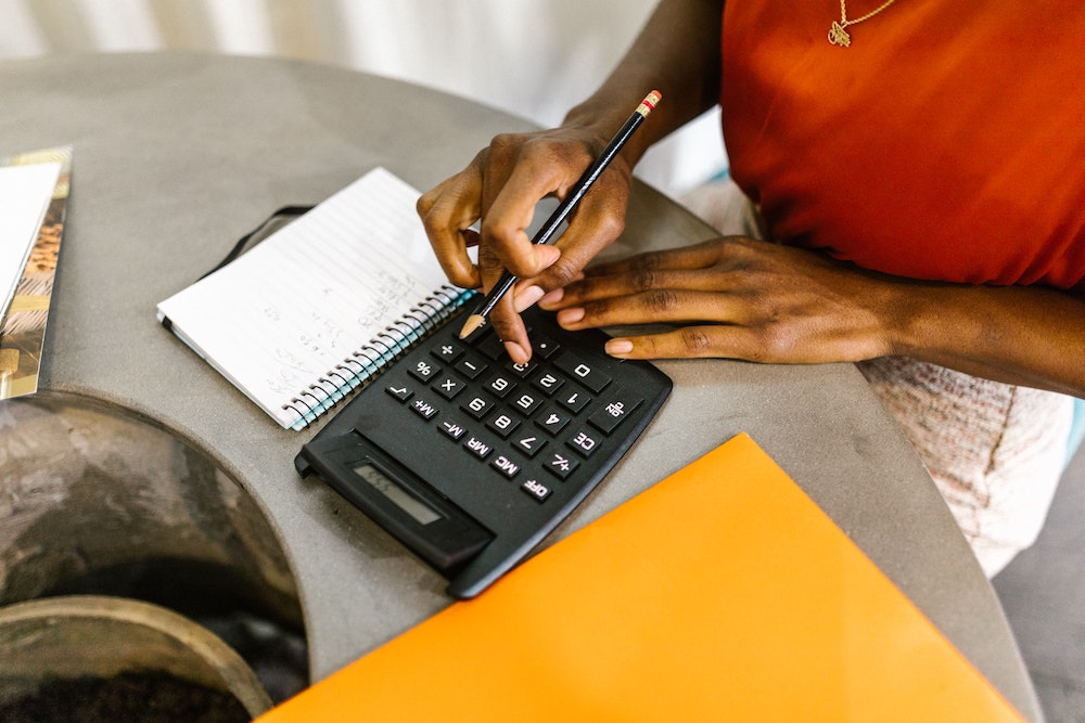 woman calculating costs