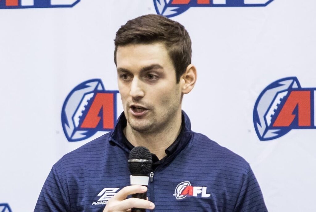 Phenom Elite's founder Nathan Dorton speaks into a microphone.